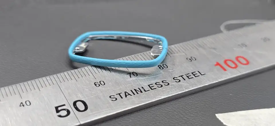 Leather measured with a ruler before cutting